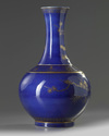 A Chinese blue-ground gilt decorated 'Three Friends of Winter' bottle vase