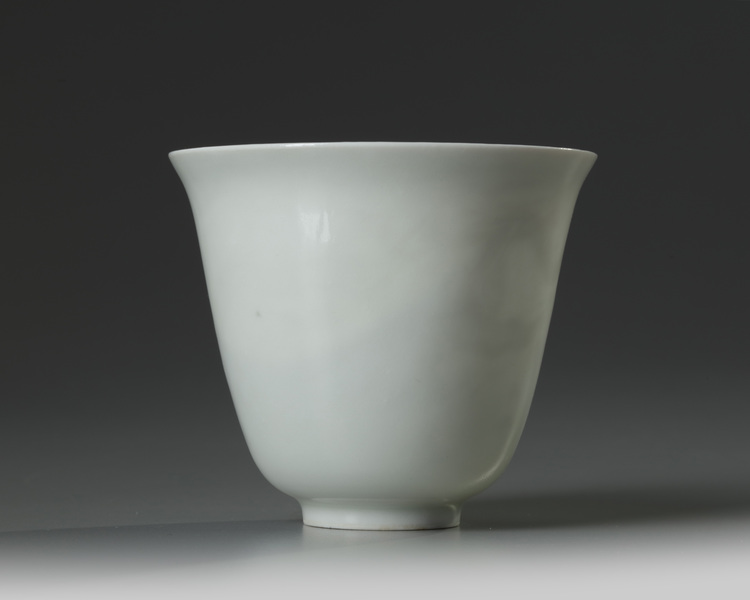 A Chinese white-glazed anhua-decorated 'dragon' cup