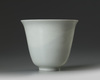 A Chinese white-glazed anhua-decorated 'dragon' cup