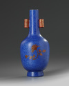 A Chinese blue-ground sgraffiato iron-red-decorated arrow vase