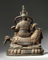 A Chinese gilt-lacquered bronze figure of Avalokitesvara