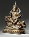 A Chinese gilt-lacquered bronze figure of Avalokitesvara