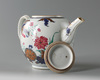 A Chinese famille rose 'pseudo-tobacco leaf' teapot