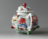 A Chinese famille rose moulded 'roosters' teapot and cover