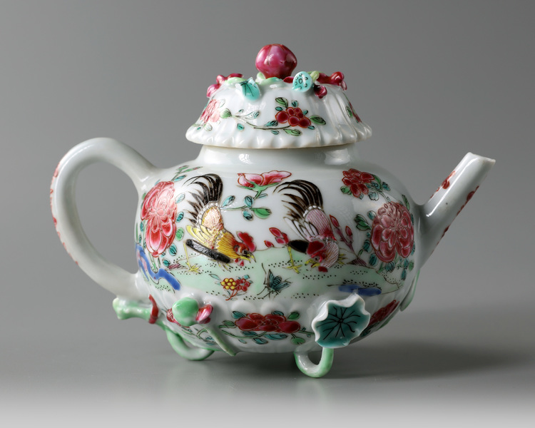 A Chinese famille rose moulded 'roosters' teapot and cover