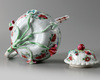 A Chinese famille rose moulded 'roosters' teapot and cover