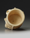 A JAPANESE OKIMONO OF A SEATED MAN