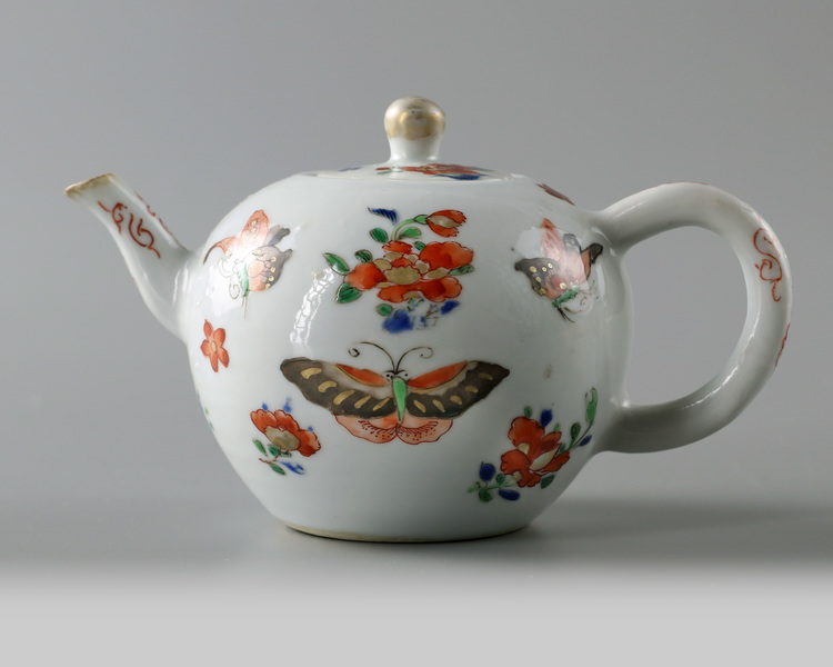 A Chinese famille verte 'butterfly' teapot and cover