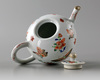 A Chinese famille verte 'butterfly' teapot and cover