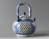A Chinese blue and white double wall reticulated teapot