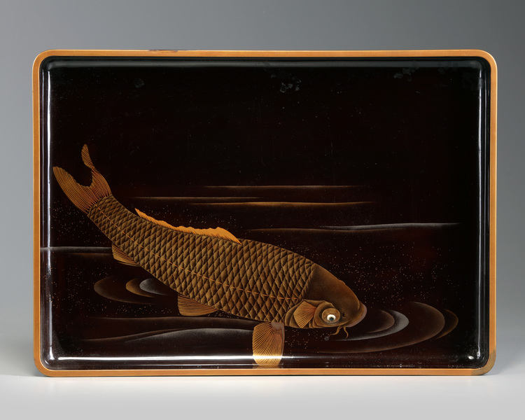 A Japanese lacquer tray decorated with a carp