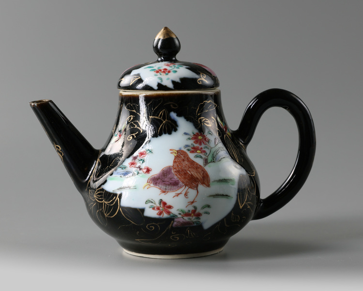 A Chinese mirror black-ground famille rose 'quails' teapot and cover