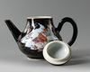 A Chinese mirror black-ground famille rose 'quails' teapot and cover