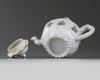 A Chinese famille rose 'lotus' teapot and cover