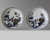 A PAIR OF CHINESE BLUE AND WHITE 'PEONY' CUPS AND SAUCERS, 18TH CENTURY