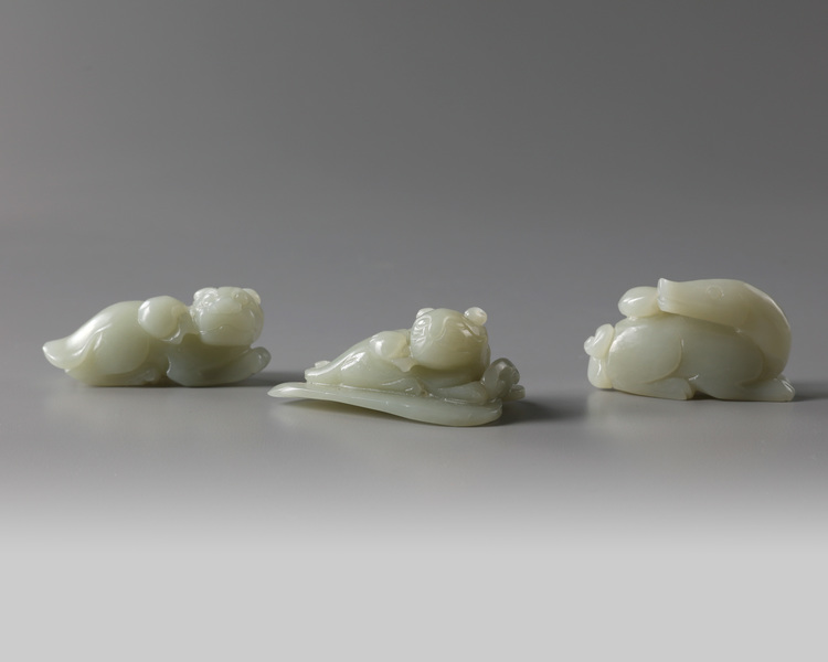 A group of three Chinese celadon jade animals