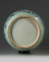 A Chinese celadon-ground blue and white vase