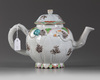 A Chinese famille rose 'lotus' teapot and cover
