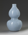 A small Chinese pale-blue crackle-glazed double gourd vase