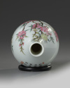 A small Chinese famille rose 'floral' bottle vase