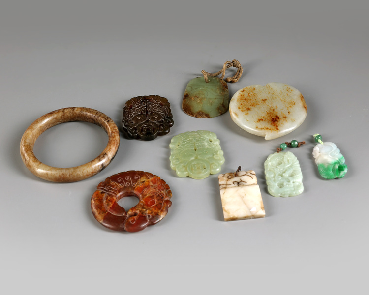 A group of nine Chinese jade objects