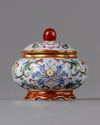 A small famille rose pot and cover