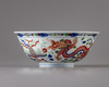 A wucai dragon and phoenix bowl