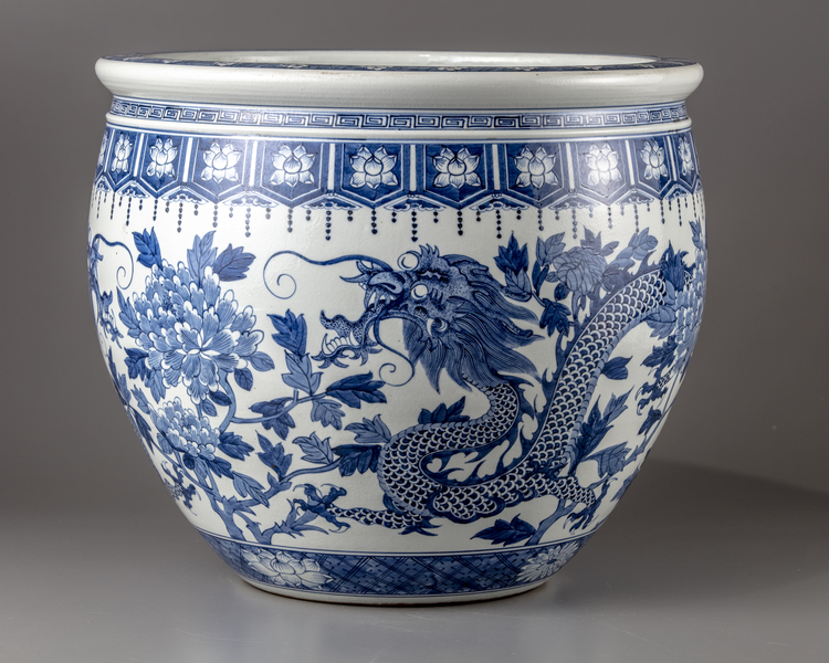 A blue and white jardiniere