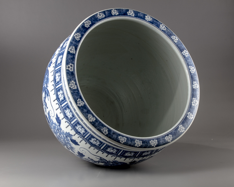 A blue and white jardiniere