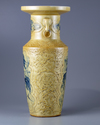 A creme ground blue and white vase