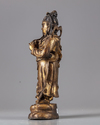 A gilt  bronze figure of Guanyu