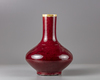 A Chinese= red glazed bottle vase