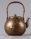 A Japanese gilt copper teapot