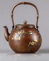 A Japanese gilt copper teapot