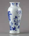 A Chinese blue and white 'Zhong Kui' slender vase