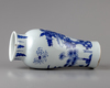 A Chinese blue and white 'Zhong Kui' slender vase