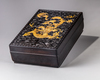 A Chinese carved and gilt zitan box and cover