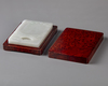 A pale jade rectangular ink stone with root wood case