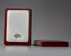 A pale jade rectangular ink stone with root wood case