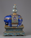 A lapis lazuli carving of a elephant with cloisonné mounts and stand