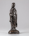 A Chinese bronze figure of a lady