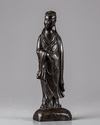 A Chinese bronze figure of a lady