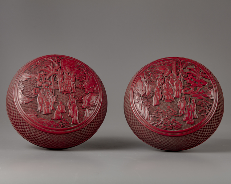 A pair of cinnabar circular lacquer boxes