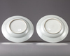 A pair of 'ladies and parasol' dishes
