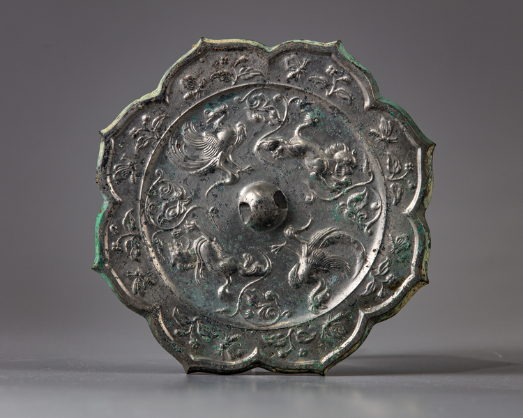 A bronze octofoil scholar mirror