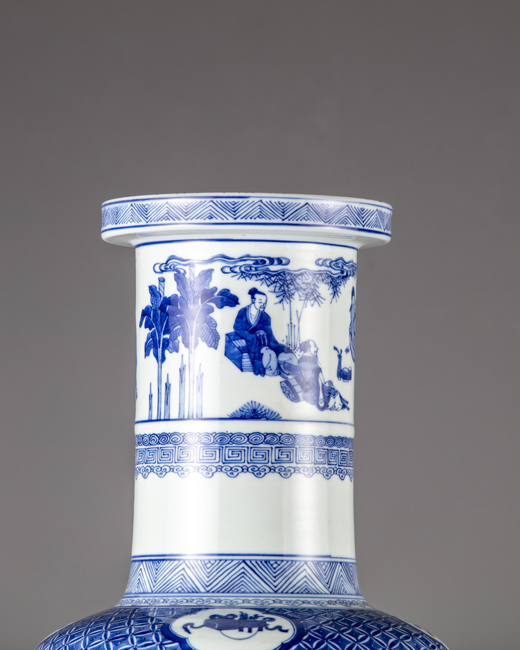 A blue and white rouleau vase