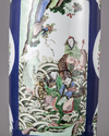 A blue glazed famille verte rouleau vase