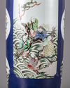 A blue glazed famille verte rouleau vase