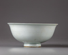 A white glazed 'dragon' bowl