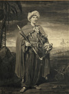 Portrait, full standing of a chief fully armed, holding a pipe